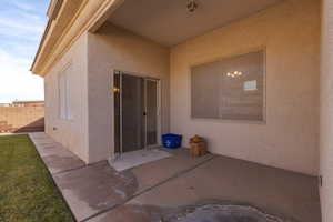 Entrance to property with a patio area