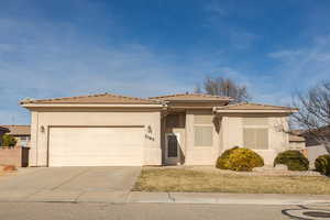 View of front of home featuring a garage