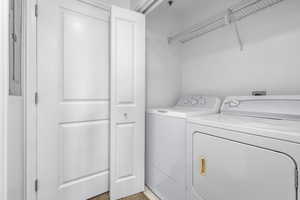 Clothes washing area with separate washer and dryer