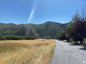 Property view of mountains featuring a rural view