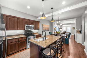 Highly coveted open concept with dedicated dining space.