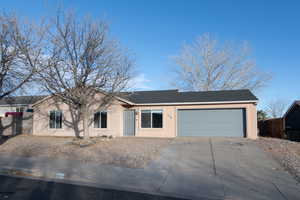 Ranch-style house with a garage