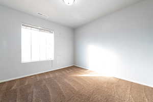 Bedroom 2 featuring carpet flooring