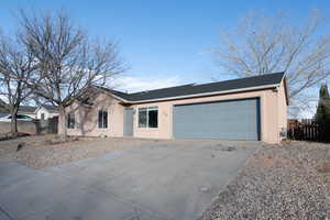 Single story home with a garage