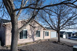 View of front of home featuring a garage