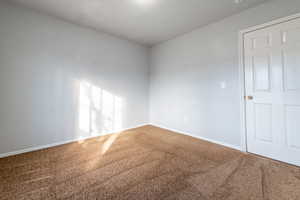 Bedroom 2 with carpet floors