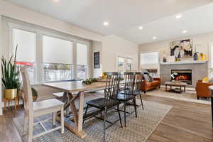 Dining area with hardwood / wood-style floors