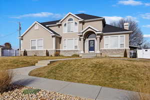 View of front of house with a front lawn