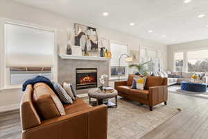 Living room with wood-type flooring