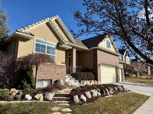 View of front of home featuring a garage