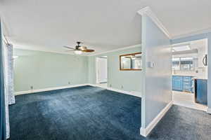 View of the living room and kitchen from the front door