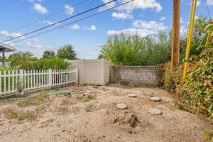 Fenced off section of the yard - perfect for a vegetable garden or a chicken coop!