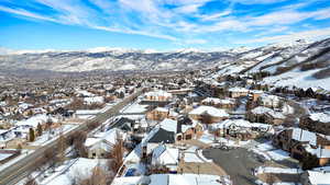 Snowy aerial view with a mountain view