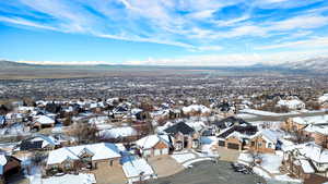 Snowy aerial view with a mountain view