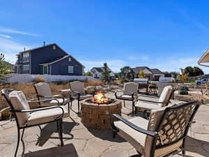 View of patio / terrace with a fire pit