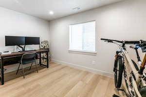 Bedroom 5 - Office with light hardwood / wood-style flooring