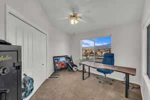 Office space with ceiling fan and carpet floors