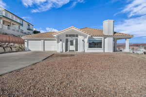 View of front of house with a garage