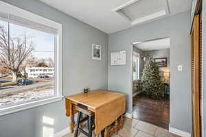 Tiled dining area with a healthy amount of sunlight