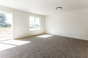 View of carpeted spare room