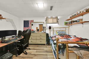 Bedroom featuring light wood-type flooring