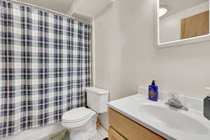 Bathroom with vanity and toilet