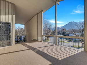 Outdoor deck area with a mountain view