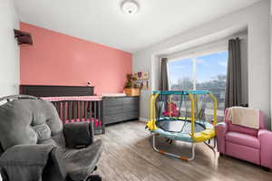 Bedroom with light wood-type flooring