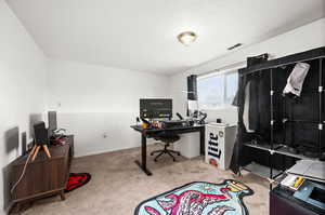 View of carpeted home office