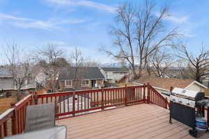 Wooden deck with a grill