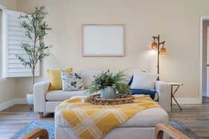 Living room featuring hardwood / wood-style flooring