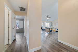 Hallway featuring light hardwood / wood-style flooring