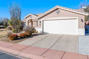 Single story home featuring a garage