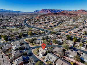 Birds eye view of property featuring a mountain view