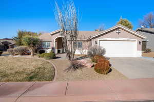 Ranch-style house featuring a garage