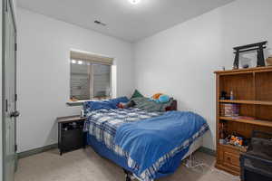 View of carpeted bedroom