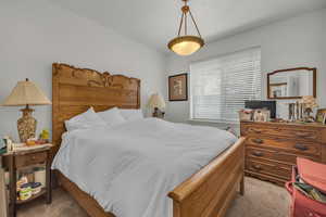 Bedroom featuring carpet