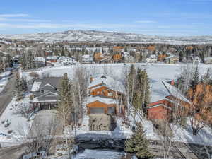 Snowy aerial view with a mountain view