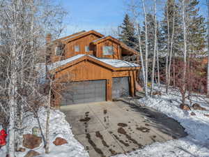 Exterior space featuring a garage