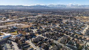 Birds eye view of property with a mountain view