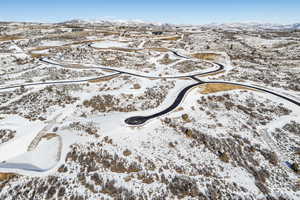 Snowy aerial view with a mountain view