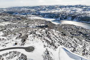 Snowy aerial view with a mountain view