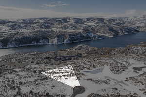 Bird's eye view with a water and mountain view