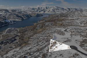 Bird's eye view with a water and mountain view