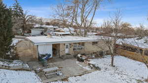 View of snow covered property