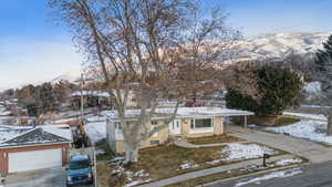 Single story home featuring a mountain view