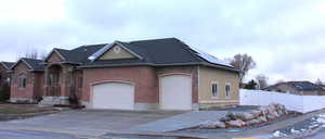 View of front of house with a garage