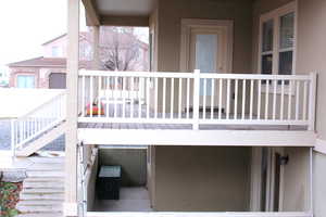 View of covered deck (above) and basement patio (below)