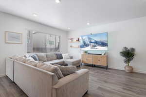 Living room featuring hardwood / wood-style flooring