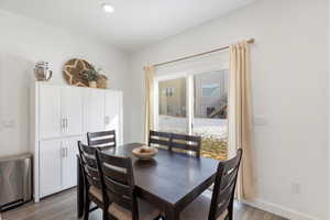 Dining space featuring hardwood / wood-style floors